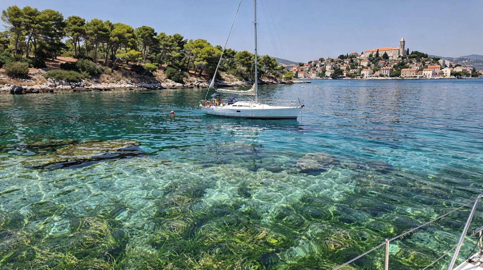 Pakleni Islands sailing and snorkeling guide — The Pakleni Islands west of Hvar are a string of 21 islets ideal for swimming, s